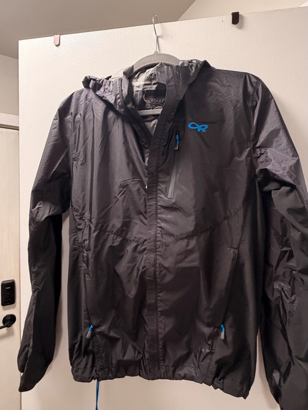 Outdoor Research Black Jacket with Blue Logo Accents